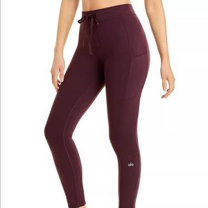 alo drawstring checkpoint leggings in oxblood